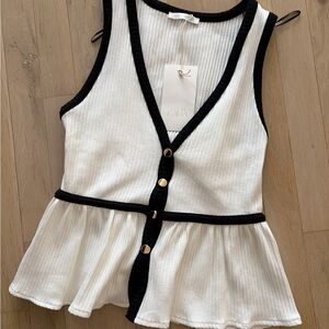 Zara Women's Black and White Buttoned Peplum Blouse